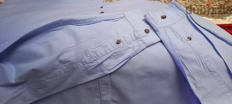 Red tag light blue cotton/ lenin blend shirt size x large fits bigger 4