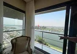 فيو خيالي علي النيل مباشرة شقة فندقيه للبيع من (هيلتون المعادي ) في ابراج نايل بيرل الشركة السعودية المصرية