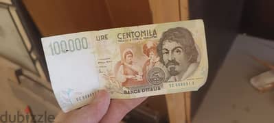 100000الف ليره ايطالي.  1954