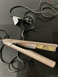 Iron Hair Curler. Professional product, for personal use.