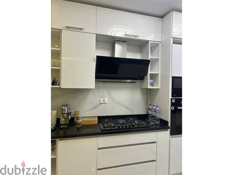 Apartment in Lake View Residence Kitchen with Appliances & Acs. 1