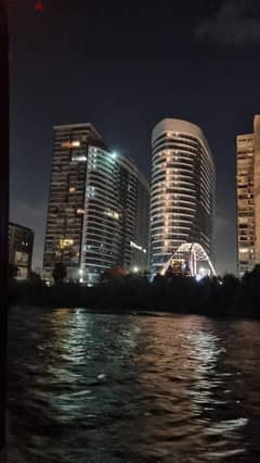 Hotel apartments 430 sqm for sale, fully finished, with a panoramic view of the Nile in Nile Pearl Towers in Maadi