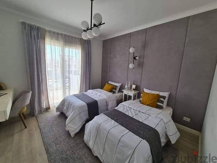 Apartment for sale, fully finished, area of ​​176 square meters, in Sodic East Compound 8