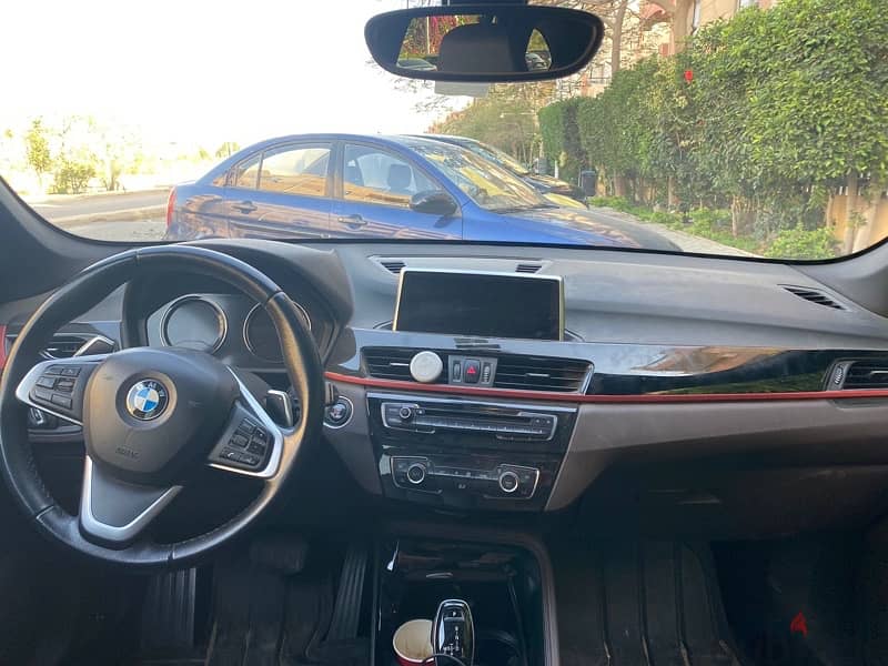 BMW x1 2019 sport 2000ccفابريكة بالكامل صيانات توكيل الحالة ممتازة 1