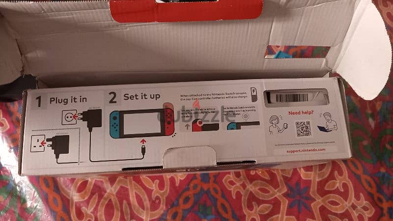 Nintendo switch blue and red used like new with the box 3