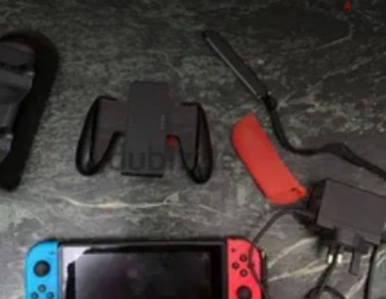 Nintendo switch blue and red used like new with the box 6