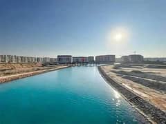248 sqm apartment, finished as a duplex, in the Latin Quarter, directly on the largest lake in El Alamein, in New Alamein, in installments.