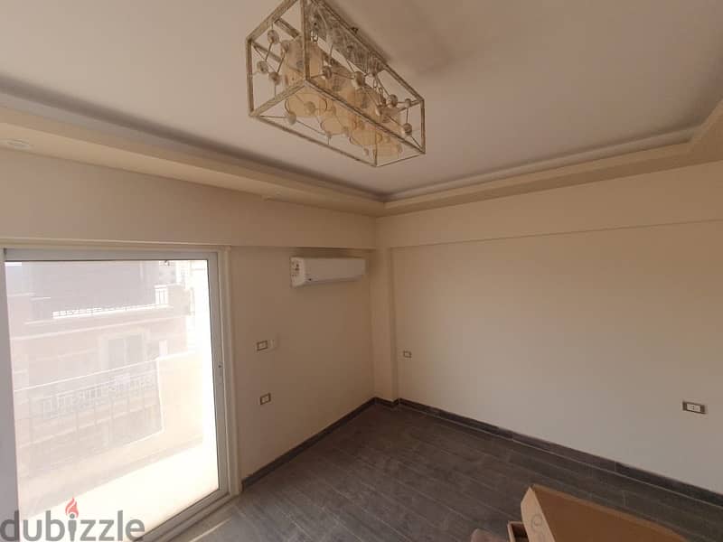 شقة روف للايجار الحي التاسع الشيخ زايد بالمطبخ والتكيفات 2