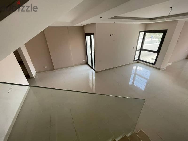 Duplex for sale in Compound The Address East 210. M with Garden 70. M, in New Cairo 12