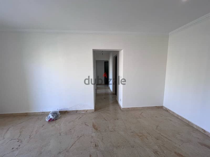 119 sqm apartment for sale in Al Rehab 2, in a very special location, steps to Mall Avenue, at a snapshot price 9