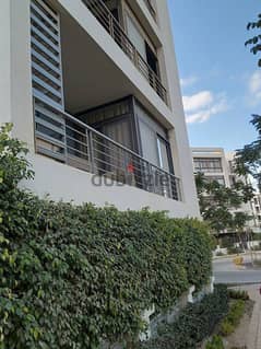 Apartment with garden for sale in the settlement, on the landscape, in the Taj City Compound, directly in front of the airport 0