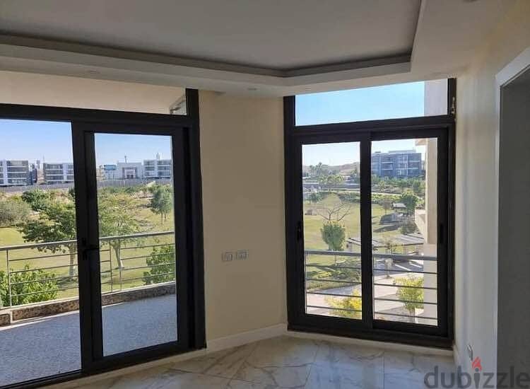 Apartment with garden for sale in the settlement, on the landscape, in the Taj City Compound, directly in front of the airport 2