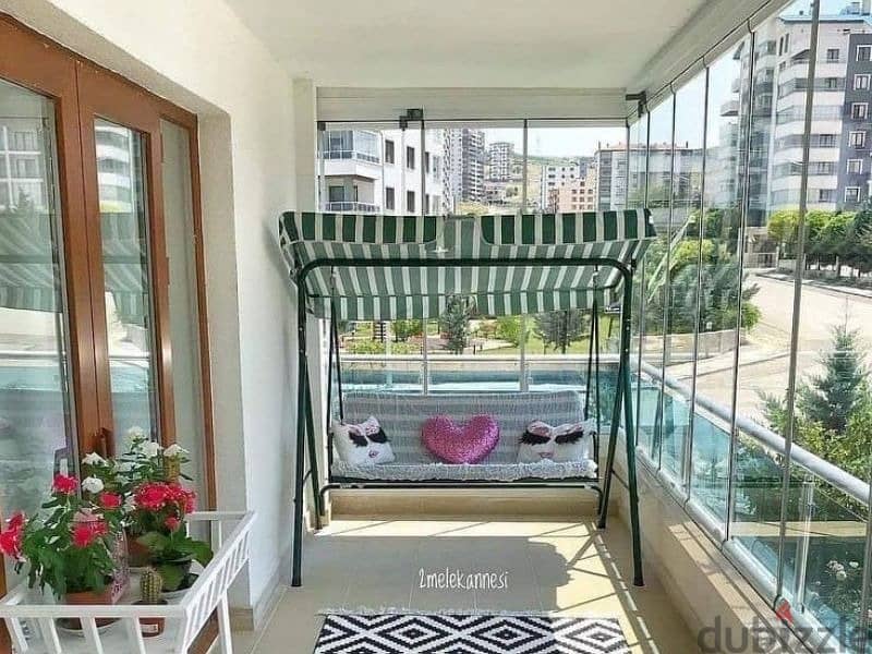Apartment with garden for sale in the settlement, on the landscape, in the Taj City Compound, directly in front of the airport 9