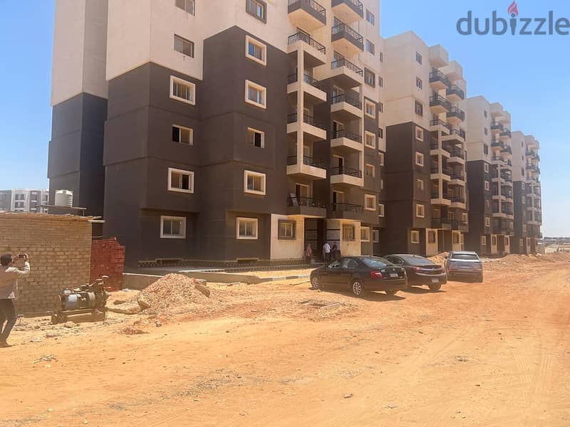See for yourself and own it at a snapshot price. . A 2-bedroom apartment in a garden next to the British University in the Staw Capital Compound 7