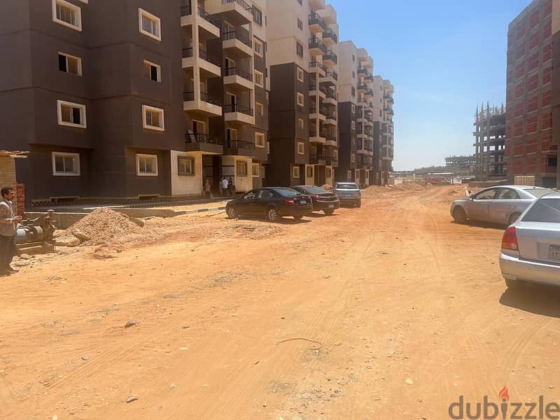 See for yourself and own it at a snapshot price. . A 2-bedroom apartment in a garden next to the British University in the Staw Capital Compound 10