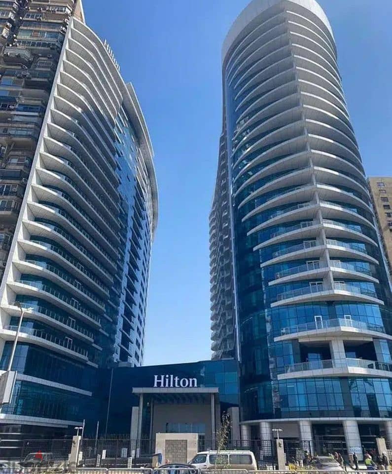apartment with view directly on the Nile, ready to move , fully finished, with air conditioning, in the Nile Pearl Towers on the Corniche for sale 3