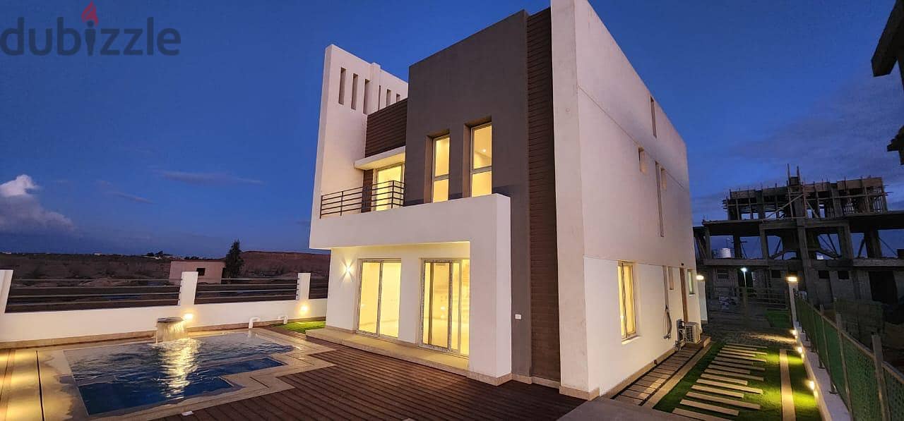 On a high hill. . an independent villa of 315 square meters for sale in installments in Ladera Heights New Zayed 4