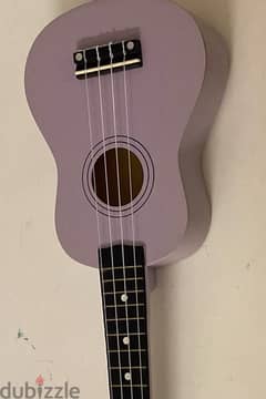يوكليلي ukulele (جيتار صغير) للبيع 0