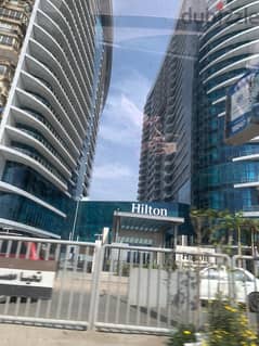 430 sqm apartment in Nile Pearl Towers for sale, immediate receipt, first row, under Hilton management, fully finished + adaptations