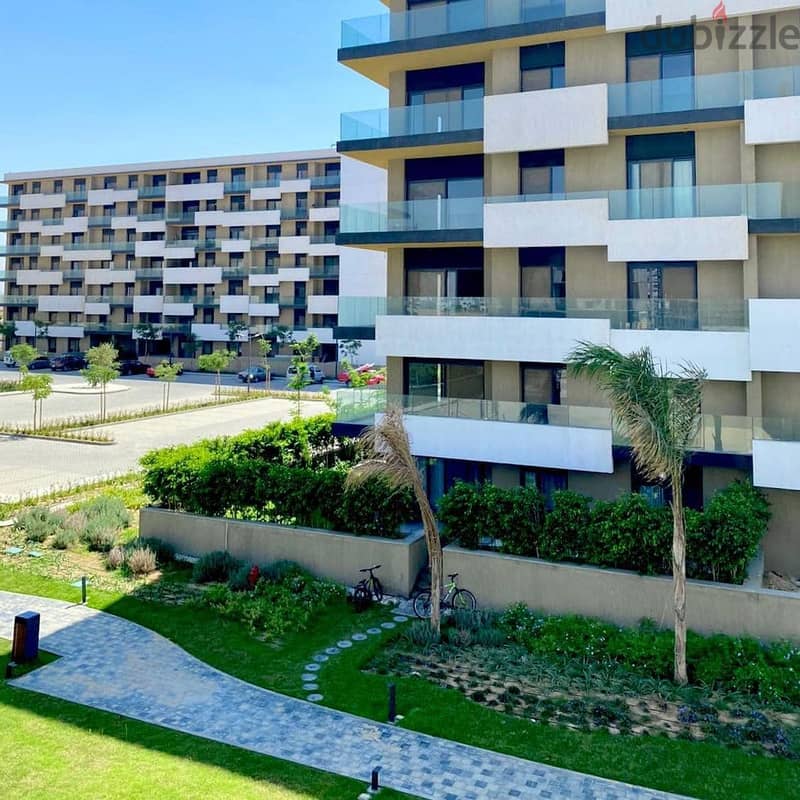 Apartment for sale, immediate receipt, down payment and installments, in Al Burouj Al Shorouk, in a very distinguished location, with an open view. 7