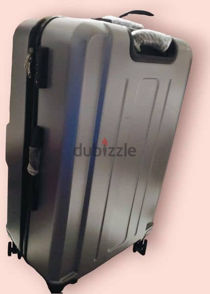حقيبة سفر ٦٦سم ٤عجلات مزدوج| Trolly bag 66 cm 4 Double wheels (silver) 1