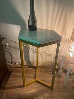 side table with white top and gold legs