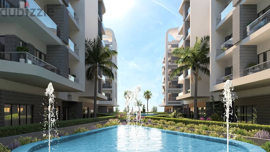 Townhouse 412 meters with garden 238 meters in a prime location on the Pool at a snapshot price in the most prestigious compound in New Mansoura with 4