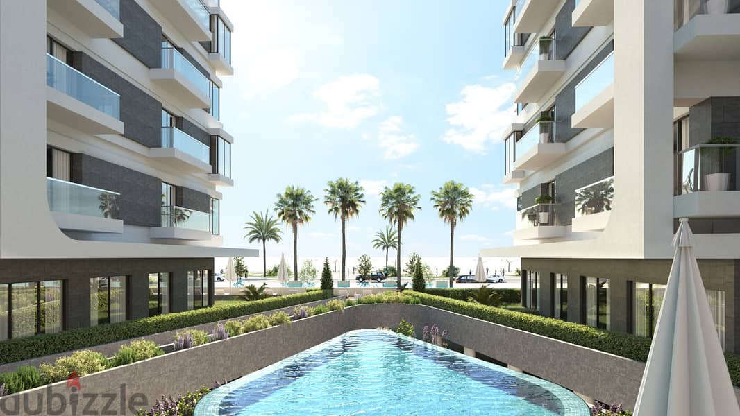 A 3-bedroom sea apartment with a view of lakes, at a discount of 40% for the first cash, in a fully-serviced residential compound in the Delta, with t 5