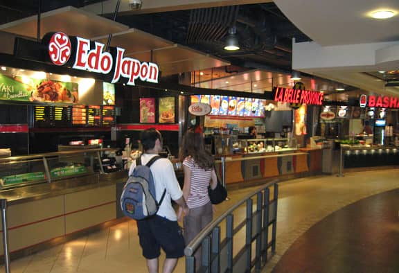 A food court store directly in front of the tables in MU23, with facilities up to 8 years 1