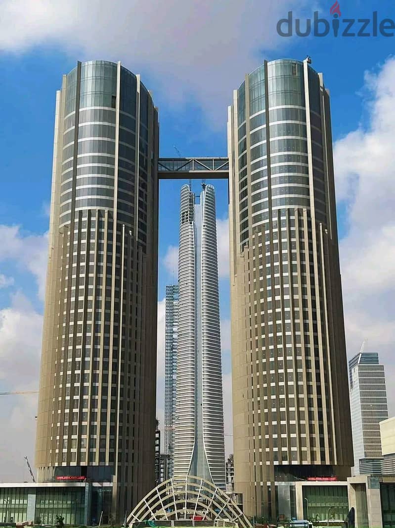 Tower office, 52 floors, directly in front of the iconic tower, at the opening prices and the Green River, the artery of the Administrative Capital. 0