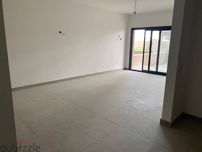 Apartment with garden for rent in Al Burouj 9