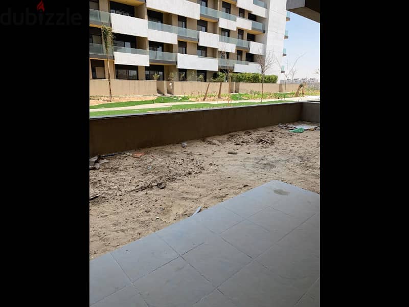 Apartment with garden for rent in Al Burouj 16