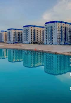 Apartment 140 SQM for sale, Lagoon View , ready to move, fully finished, in the Latin District in New Alamein City, North Coast
