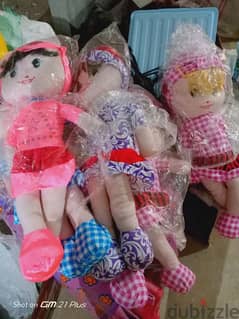 Six brand-new dolls are for sale.