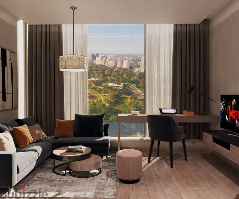 3-bedroom apartment with a garden view next to Central Park, 40 acres, two hotels and a university next to the Capital Airport and the Zohour Club 4
