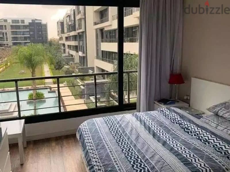 Apartment 203 + garden at a special price in Waterway New Cairo 6