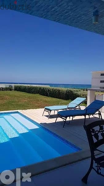 First row villa overlooking the sea for sale on the North Coast in De Bay Village, developed by Tatweer Misr 7