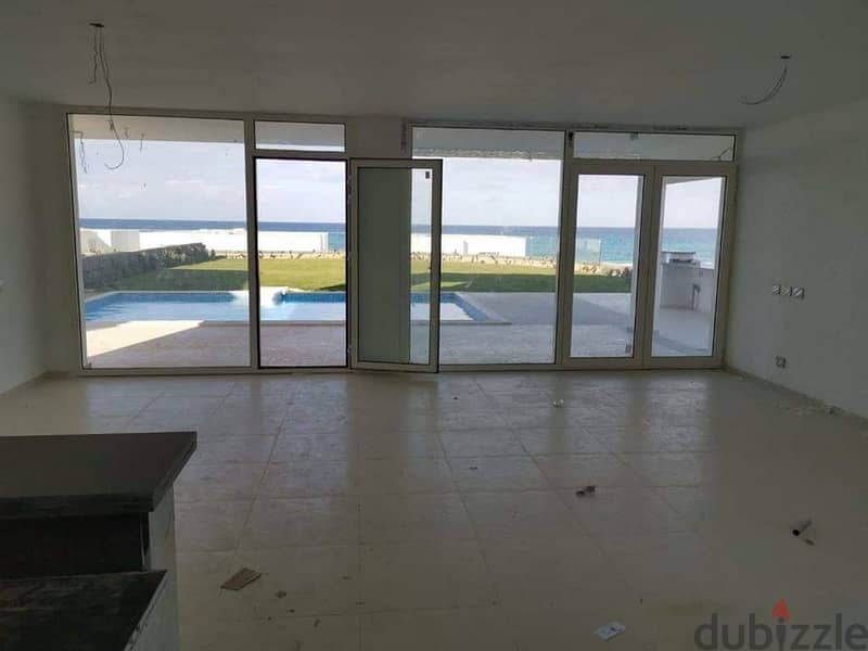 First row villa overlooking the sea for sale on the North Coast in De Bay Village, developed by Tatweer Misr 16