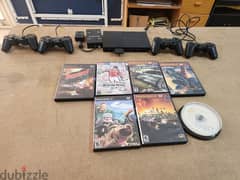 Playstation 2 + 4 controllers + games