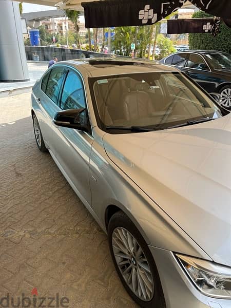 BMW 320i luxury silver fabrica fully loaded sound system 1