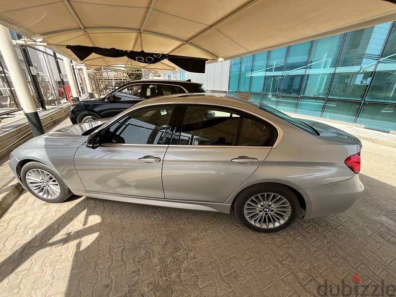 BMW 320i luxury silver fabrica fully loaded sound system 3