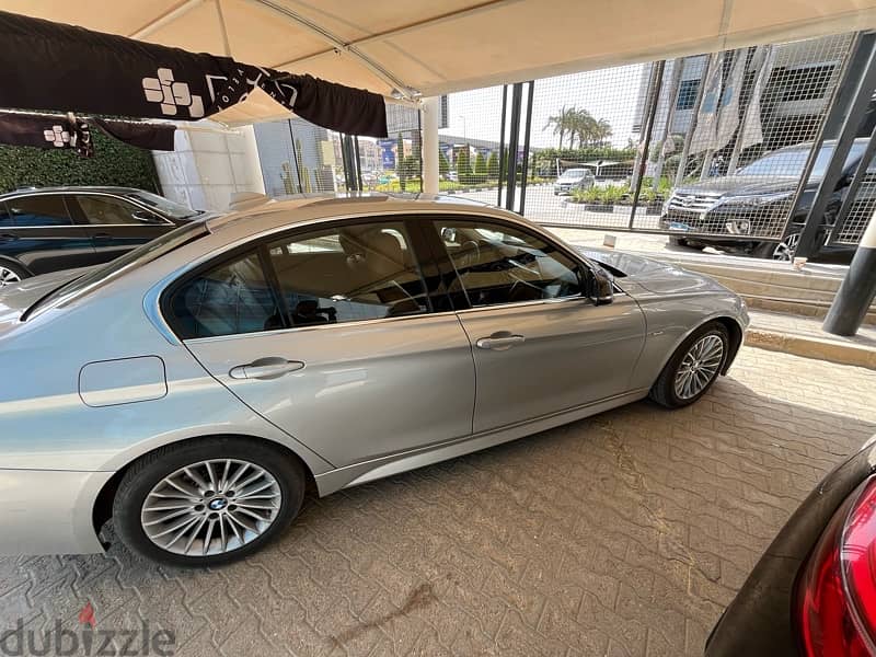 BMW 320i luxury silver fabrica fully loaded sound system 4