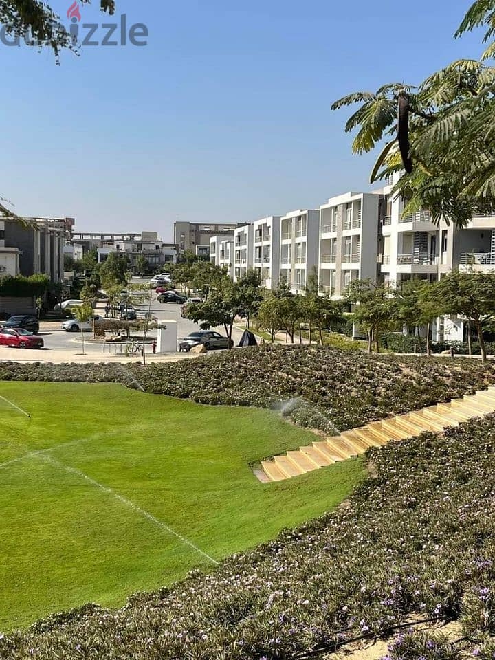 An apartment on Suez Road in front of the airport, minutes from Nasr City and Heliopolis, for sale with the longest interest-free payment period 7