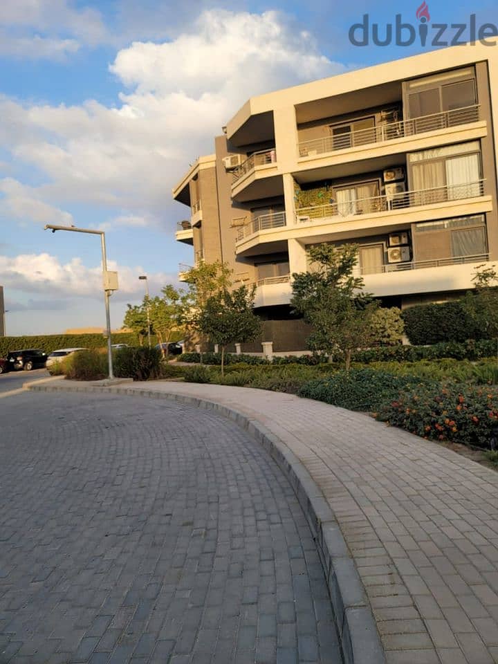 An apartment on Suez Road in front of the airport, minutes from Nasr City and Heliopolis, for sale with the longest interest-free payment period 8