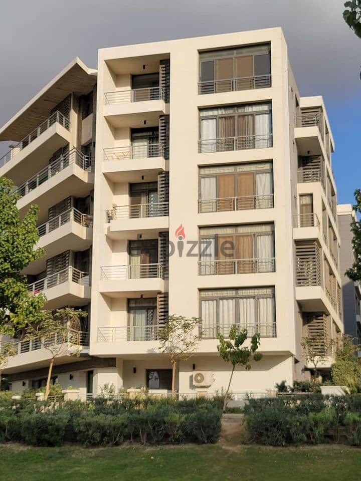 An apartment on Suez Road in front of the airport, minutes from Nasr City and Heliopolis, for sale with the longest interest-free payment period 9