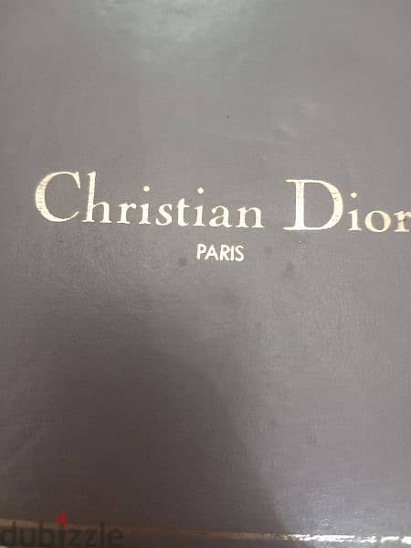 الولاعه الدهب من  Christian Dior 1