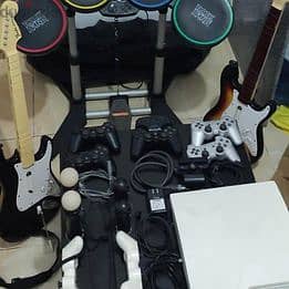 Move kit + Rock Band & Guitar Hero Games 6