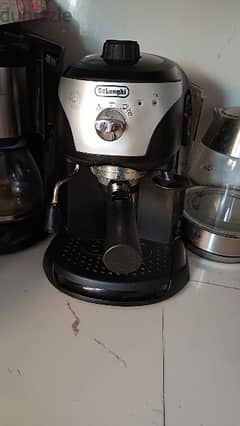 ماكينه القهوه ديلونجي لعمل الاسبريسو والكابتشينو 0