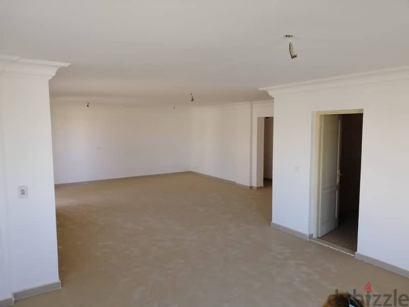 "I have a 245 square meter apartment for sale in Madinaty, overlooking a square, near the Open air mall. " 2
