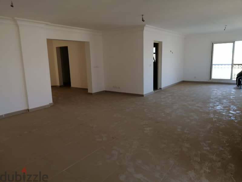 "I have a 245 square meter apartment for sale in Madinaty, overlooking a square, near the Open air mall. " 4